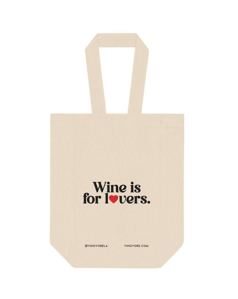 Simply put, a wine-lover's favorite. This double wine tote bag is made with 100% cotton canvas and features a handy partition to perfectly hold 2x 25 fl Oz (750ml) wine bottles.   .: 100% cotton canvas .: Heavy fabric .: Holds two 25oz (750ml) wine bottles .: One-sided print