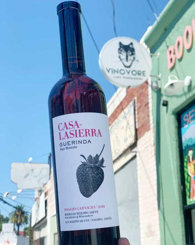 100% Garnacha Navarra, Spain.  Women winemakers - Yoanna + Maria. Wild strawberries. Hot pink salmon. Full-bodied rosé. Mediterranean herbs. Afternoon delight! Sky rockets in flight! Fleshy + warm.